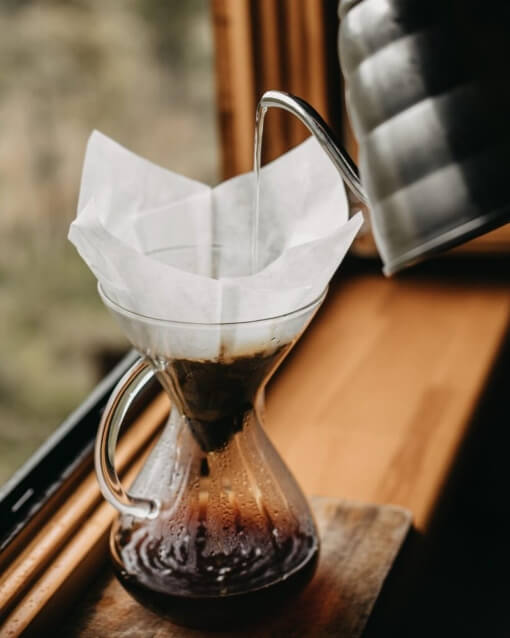 Water Pouring Over Coffee Grounds